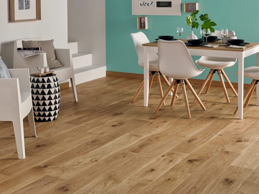 Dining room with plank flooring
